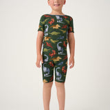 Boy wearing the Dino Forest bamboo short pajama set